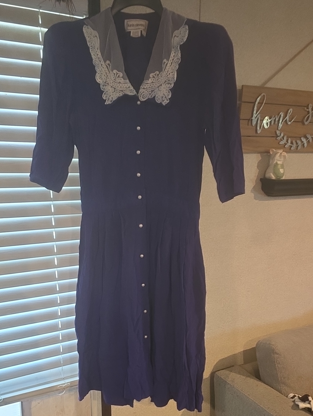 karin stevens purple dress with lace collar